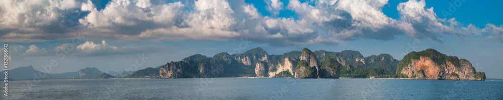 Tropical paradise of Railay Beach in Phuket with limestone cliffs and crystal waters