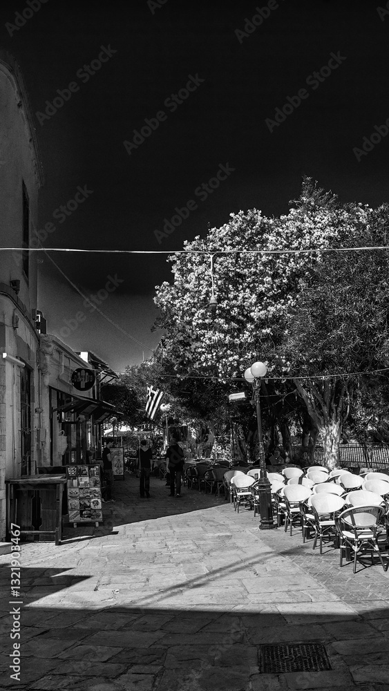 Kos, Greece - June 5, 2014: Charming streets of Kos on a bright sunny day with traditional architecture
