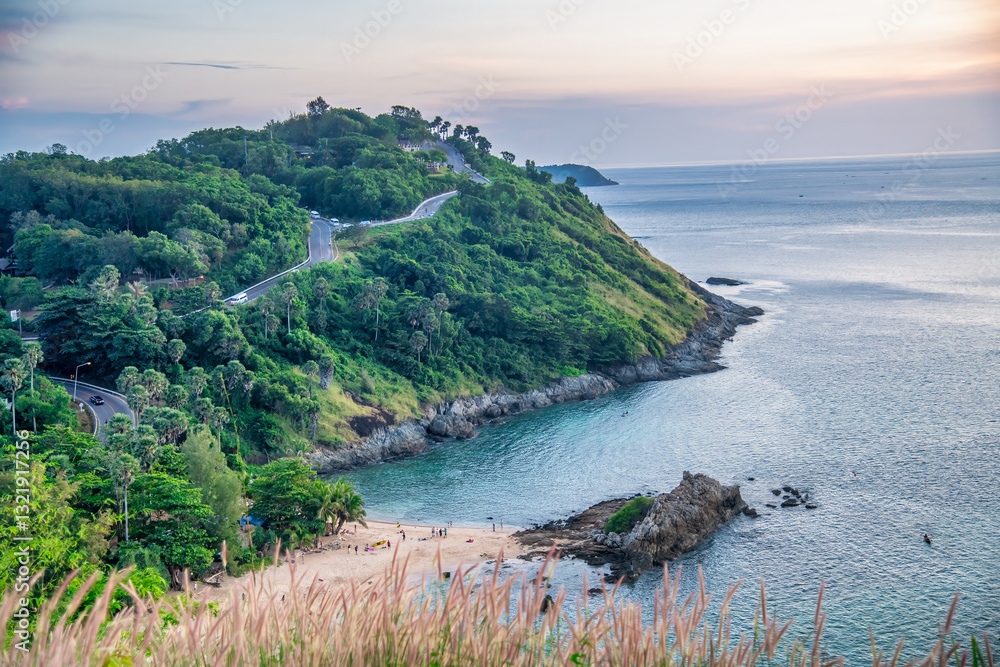 Breathtaking aerial view of Phuket Island at sunset with golden sky and ocean
