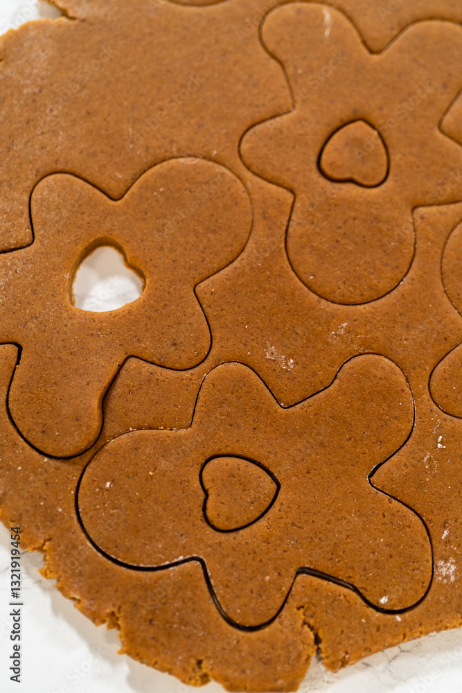 Preparing and Baking Classic Gingerbread Cookies in Gingerbread Man Shapes Preparing and Baking Classic Gingerbread Cookies in Gingerbread Man Shapes