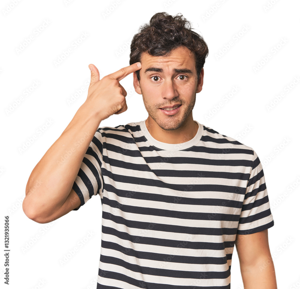 Young Hispanic man in studio showing a disappointment gesture with forefinger. Young Hispanic man in studio showing a disappointment gesture with forefinger.