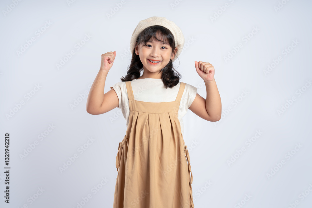 Portrait of beautiful Asian girl posing on white background, child Portrait of beautiful Asian girl posing on white background, child
