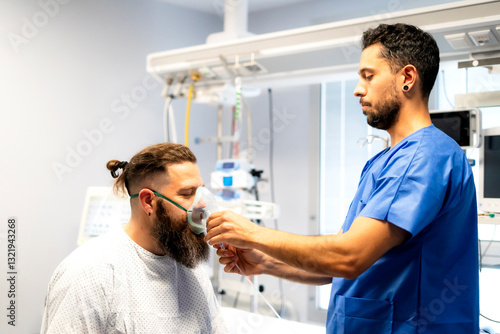 Obraz na płótnie Nurse placing oxygen mask on patient in hospital room