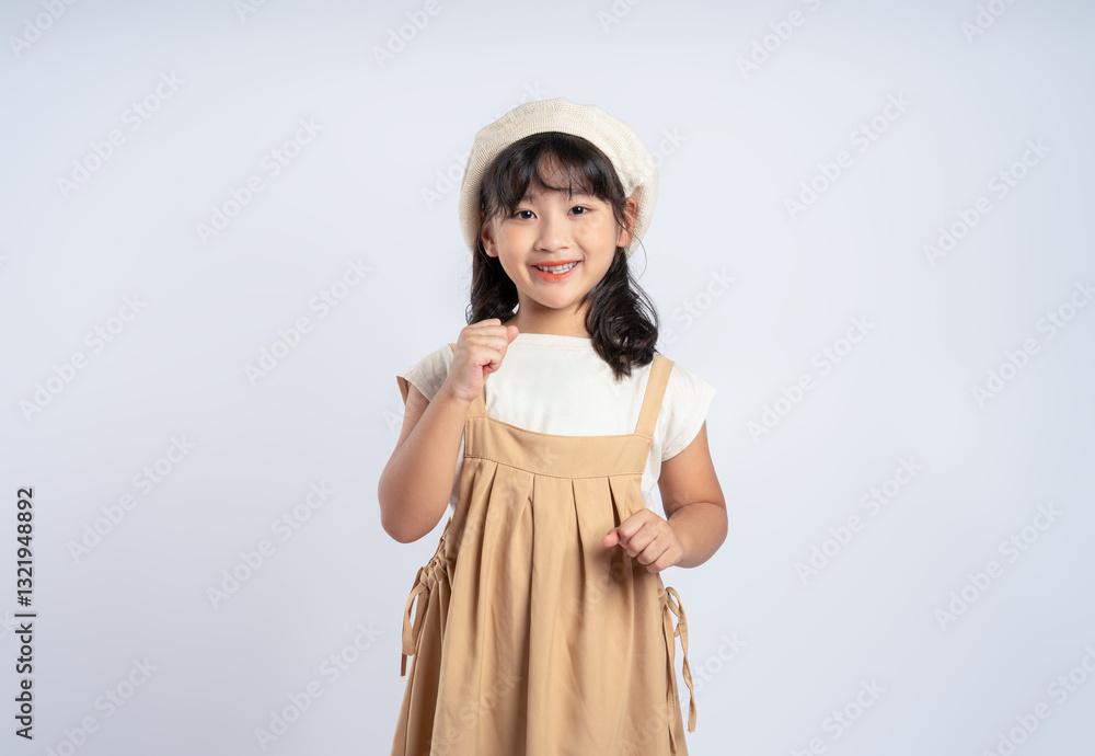 Portrait of beautiful Asian girl posing on white background, child Portrait of beautiful Asian girl posing on white background, child