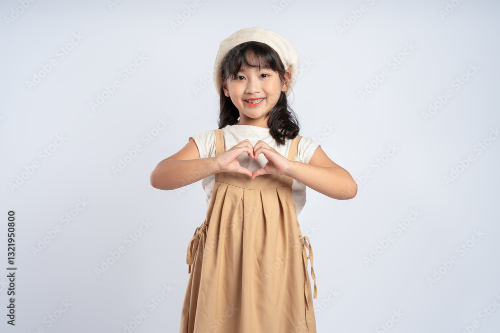 Portrait of beautiful Asian girl posing on white background, child Portrait of beautiful Asian girl posing on white background, child