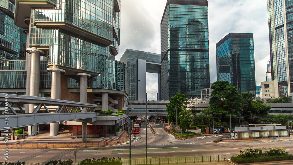 Naklejka premium Hong Kong overpass in Central timelapse hyperlapse. Locals and tourists use overpasses to cross downtown streets.