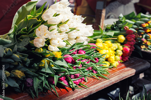 Canvas Print Close-up rows fresh yellow Dutch tulip bouquets lay wooden table vibrant street flower market sale