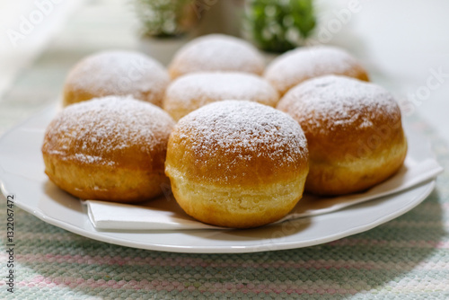 Fresh baked homemade donuts on the table