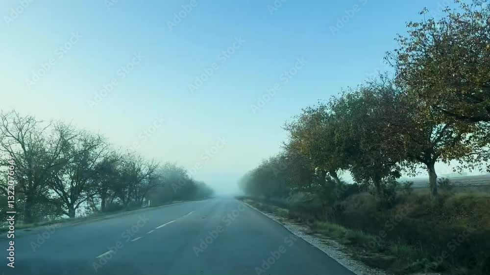 Empty highway road with fog and blue sky Empty highway road with fog and blue sky