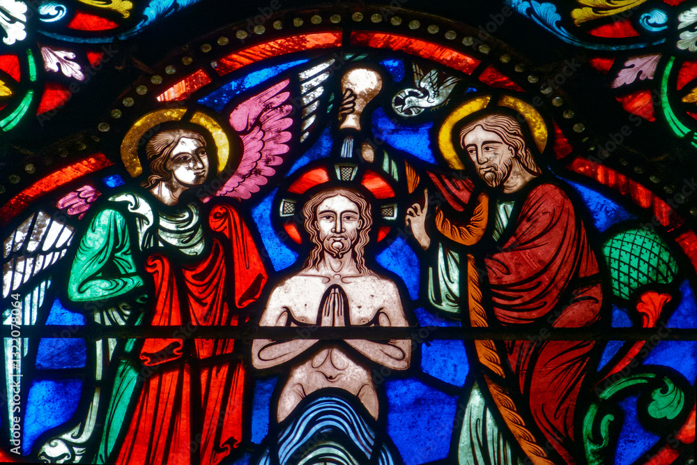 Obraz premium Stained glass (19th century) of Baptism of Jesus by John the Baptist in the Jordan river.