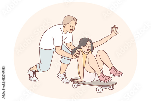 Young couple fun in skate park, enjoying pleasure of relaxing together and riding skateboard