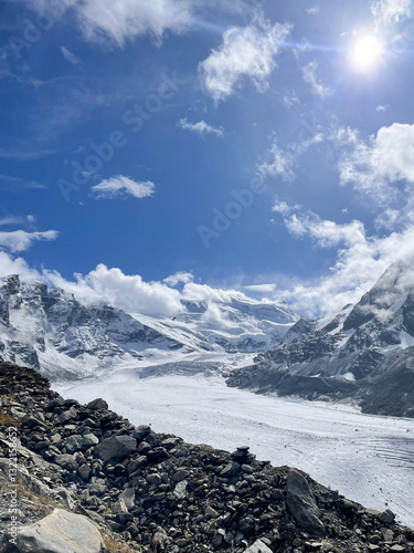 Obraz na płótnie mountain landscape with clouds and snow. We can see a glacier in the background. Swiss Alps w salonie