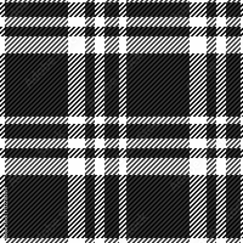 Stylish black and white plaid pattern.  Perfect for textile designs, backgrounds, and website banners.  This classic monochrome texture evokes feelings of sophistication and timeless style.