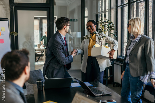 Schilderij op canvas A group of coworkers is saying goodbye to an old colleague who is leaving the office