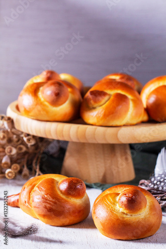 Obraz na płótnie Larks - birds made of dough, to welcome spring. Traditional festive bread bird made of buttery dough. cooking homemade cakes, process w salonie