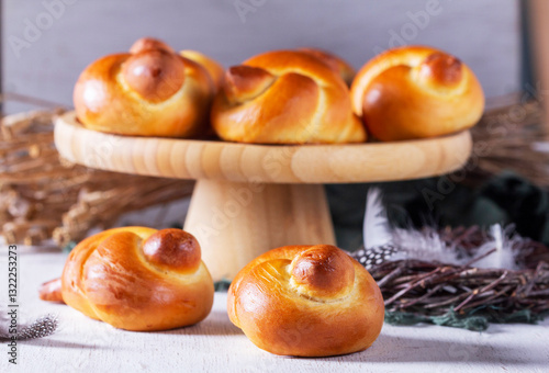 Obraz na płótnie Larks - birds made of dough, to welcome spring. Traditional festive bread bird made of buttery dough. cooking homemade cakes, process w salonie
