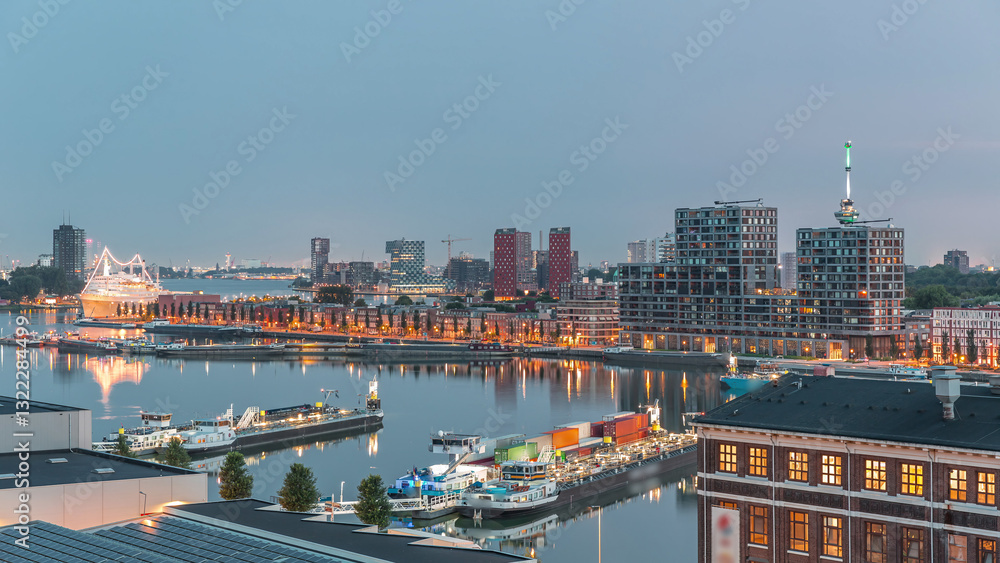 Obraz premium Aerial view over towers in Maashaven night to day timelapse in Rotterdam