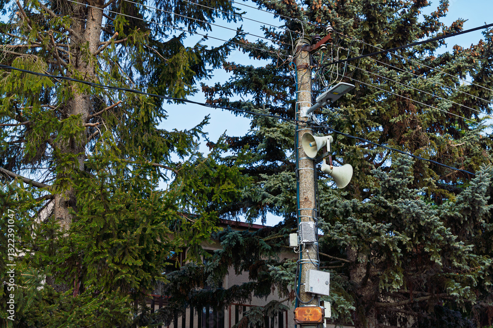 Fototapeta premium outdoor radio amplion, megaphone, used to announce public information in the village. Speaker on high tower.