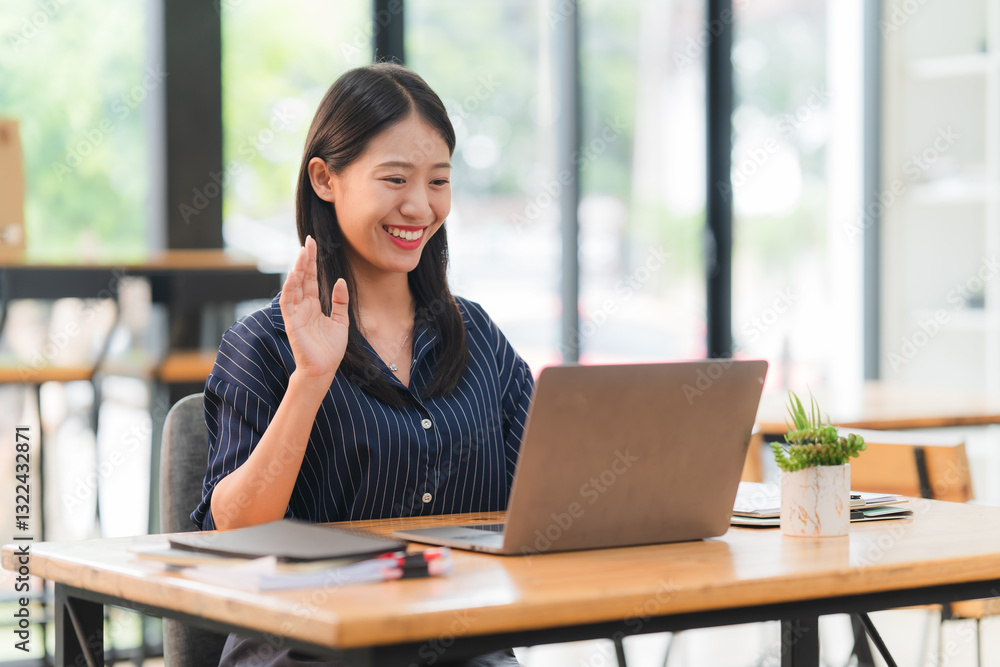 Smiling Asian Woman Video Calling on Laptop Smiling Asian Woman Video Calling on Laptop