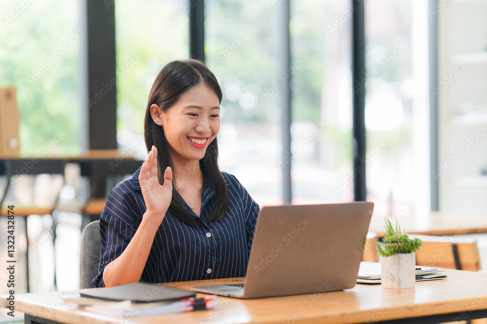 Smiling Asian Woman Video Calling on Laptop Smiling Asian Woman Video Calling on Laptop