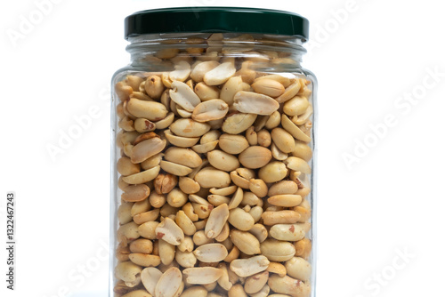 Foto Glass jar with green lid filled with peanuts on isolated white background