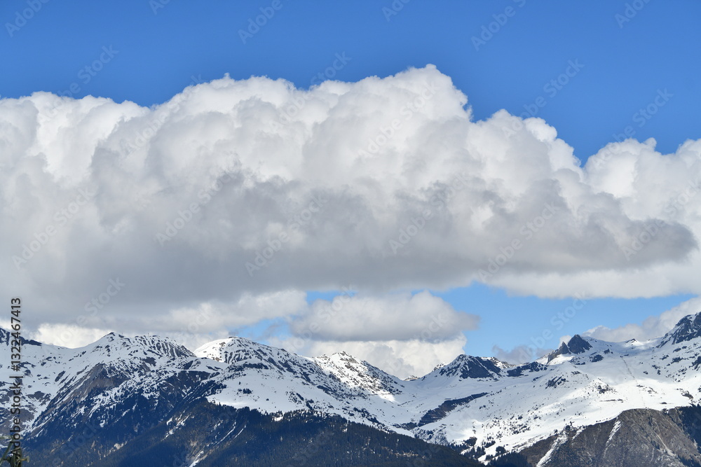 Fototapeta premium Amazing French alps by winter under snow and clouds