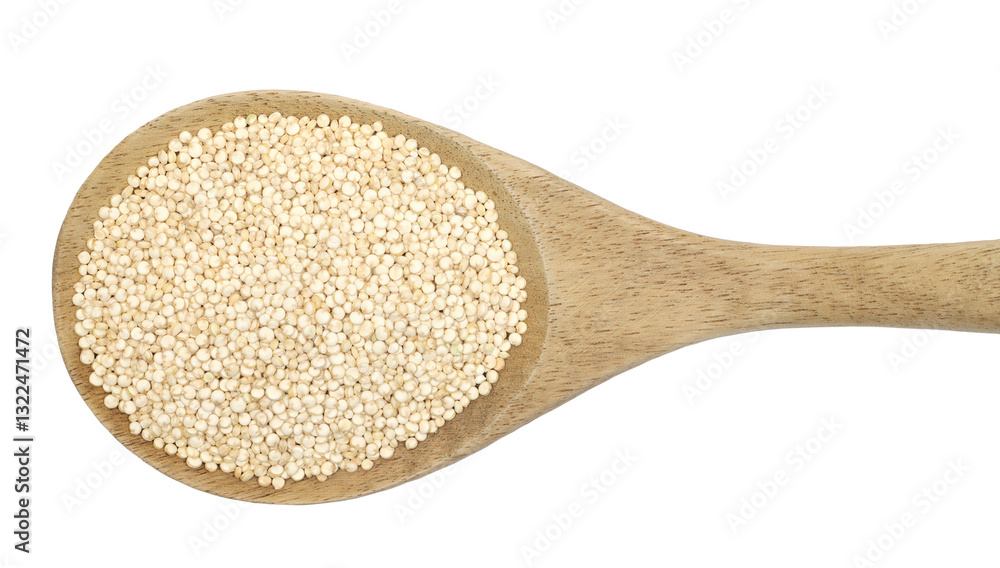 Pile of raw quinoa seeds in wooden spoon, isolated on white background, top view Pile of raw quinoa seeds in wooden spoon, isolated on white background, top view