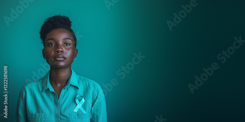 Strong Black Woman with Teal Awareness Ribbon in Monochromatic Portrait background with copy space