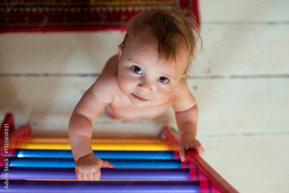 Baby Climbing a Colorful Ladder Baby Climbing a Colorful Ladder
