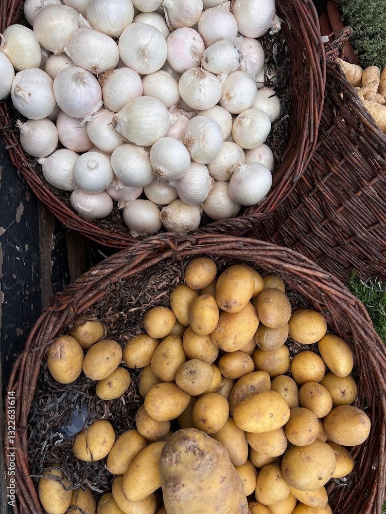 Garlic and Potatoes in Rustic Baskets Garlic and Potatoes in Rustic Baskets