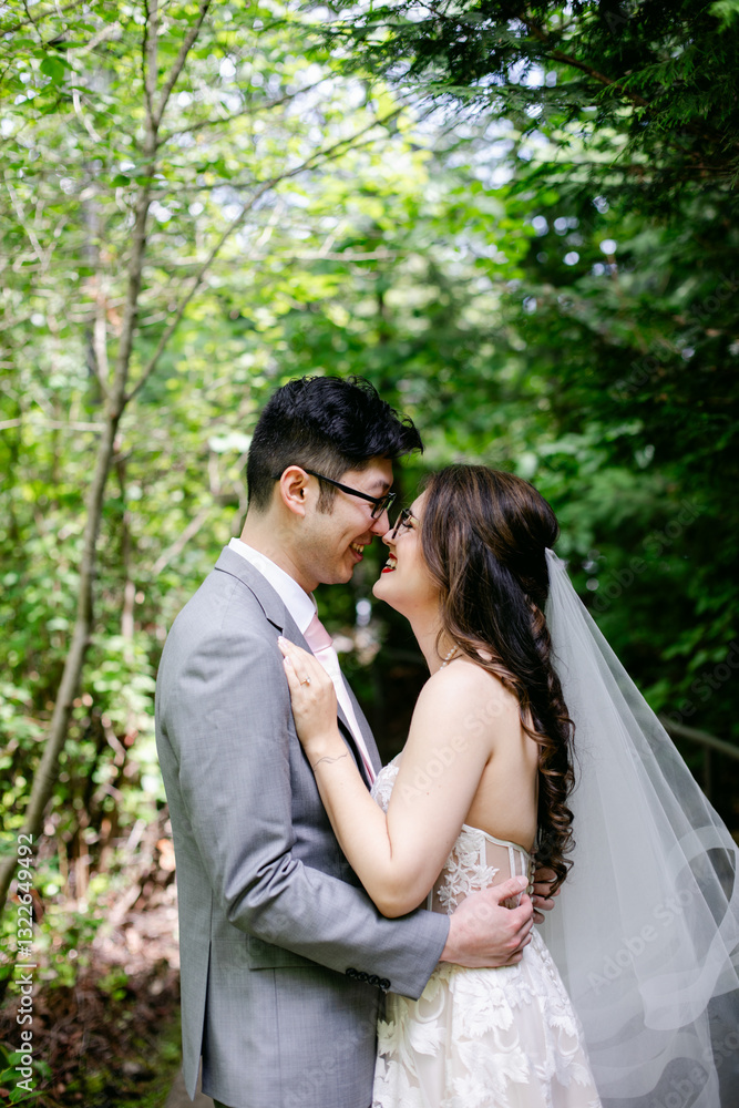 Smiling Bride and Groom Cozy up in Woods Smiling Bride and Groom Cozy up in Woods