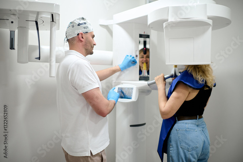 woman doing teeth roentgen at light medical clinic