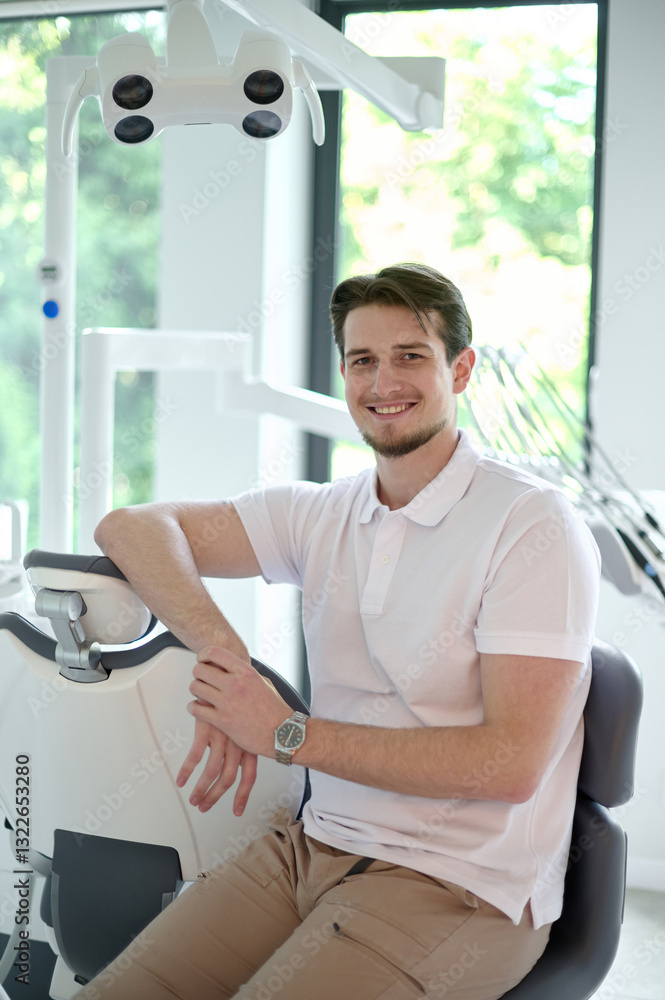 Portrait of smiling successful male dentist Portrait of smiling successful male dentist