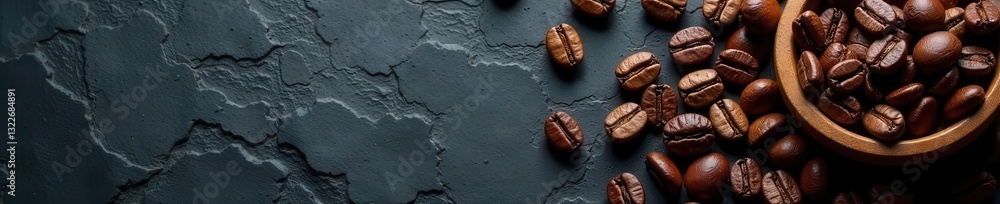 Dark stone background, coffee beans scattered, ample copy space , grain, top view Dark stone background, coffee beans scattered, ample copy space , grain, top view