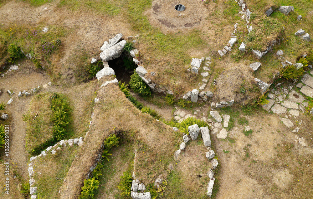 Carn Euny prehistoric Iron Age village houses approx. 100 BC near Lands End, Cornwall, England. Entrance to fogou underground passage chamber central