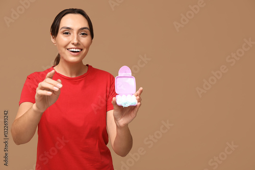 Beautiful young woman with ...