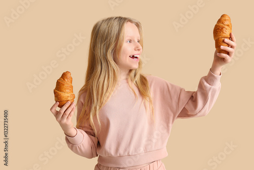 Cute little girl with tasty...