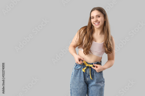 Pretty young woman in loose...