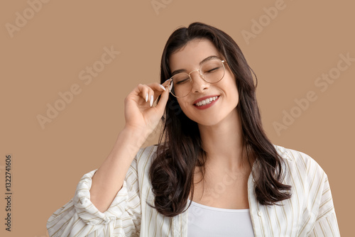 Happy smiling young woman i...