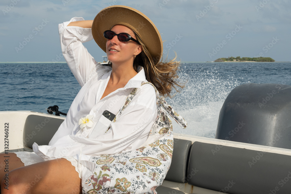 © Alina Hvostikova/Stocksy - Enjoying a sunny boat ride in a coastal paradise © Alina Hvostikova/Stocksy - Enjoying a sunny boat ride in a coastal paradise