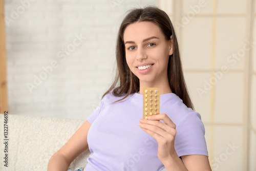 Beautiful young woman with ...