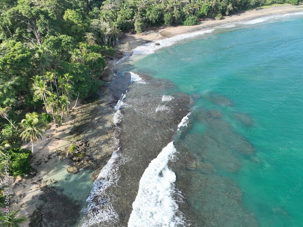 Playa Cocles and Limon coastline: turquoise waters meet lush jungle.