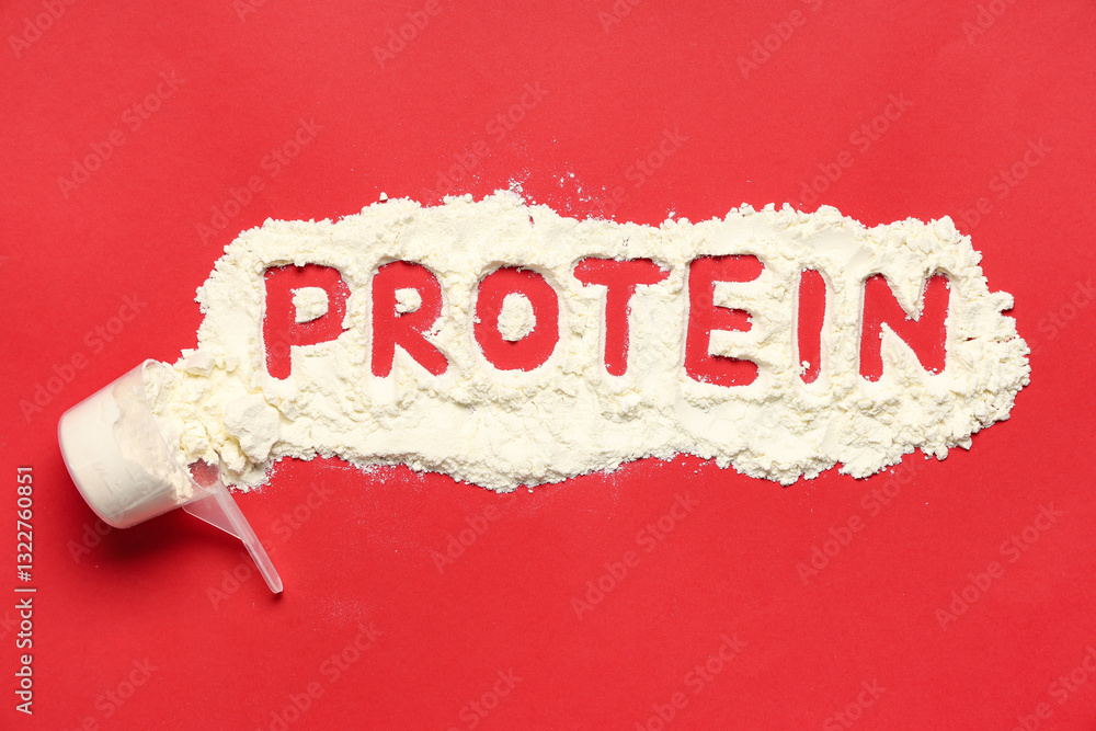 Fototapeta premium Word PROTEIN made of powder on red background