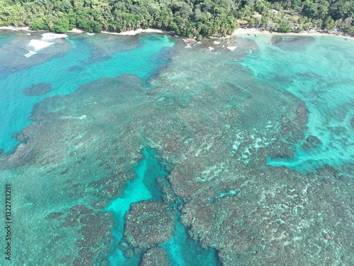 Playa Cocles and Limon vibrant coral reef from above.