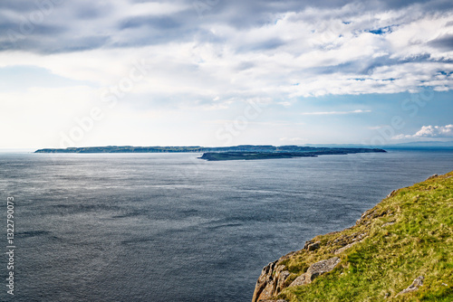 Obraz na płótnie Rathlin Island seen from the cliff top of Fair Head on the north Antrim coast at Ballycastle, N. Ireland w salonie