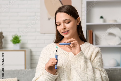 Young woman with pen for in...