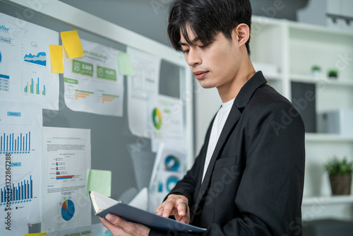 Wallpaper Mural Asian young businessman working in conference room at the modern office.  Torontodigital.ca