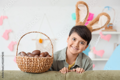 Cute boy in bunny ears and ...