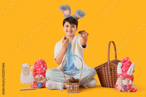 Cute boy in bunny ears with...