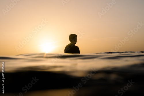 Wallpaper Mural Silhouette of a surfer floating at Lanzarote's coast during a sunset Torontodigital.ca